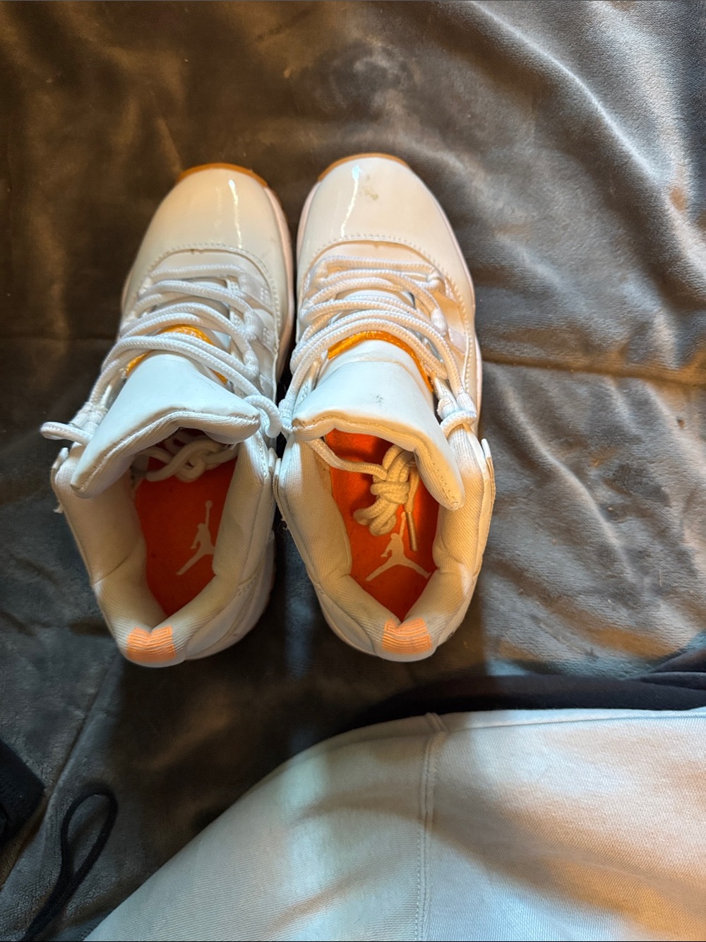 Jordan Kids White Sneakers with Orange Accents